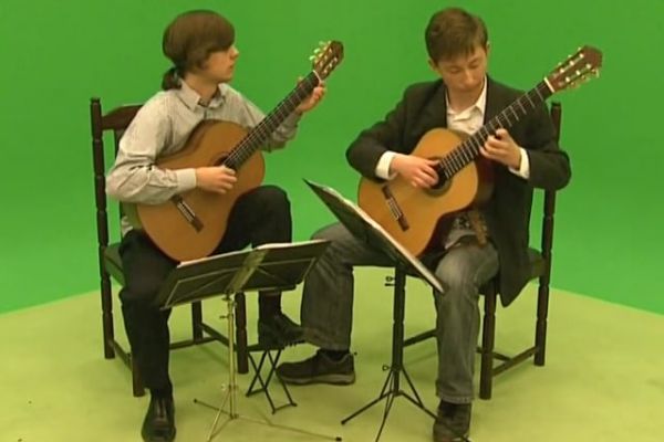 Prezentacja muzyki gitarowej Tomasza Grzybowskiego i Filipa Tuza - utwór 5 - Portal Informacji Kulturalnej